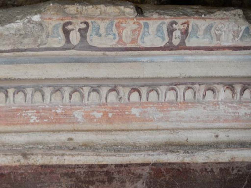 VI.15.8 Pompeii. May 2015. Detail of stucco on upper west side of centre of south wall. Photo courtesy of Buzz Ferebee.