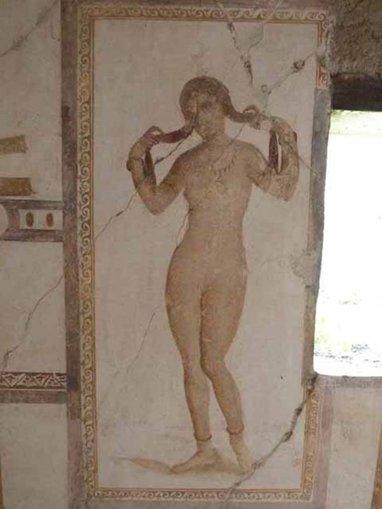 VI.15.8 Pompeii. December 2007. Fresco of female figure (Venus?) on the west wall of the summer triclinium.