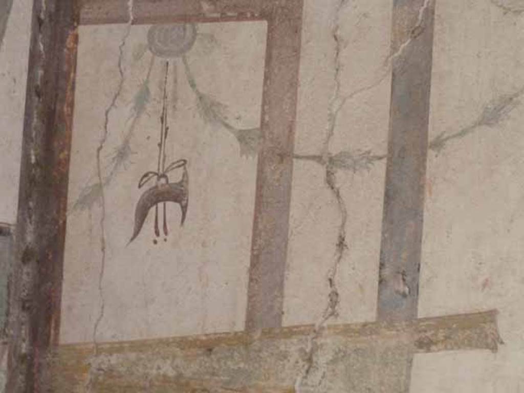 VI.15.8 Pompeii. May 2010. Detail from the west wall.