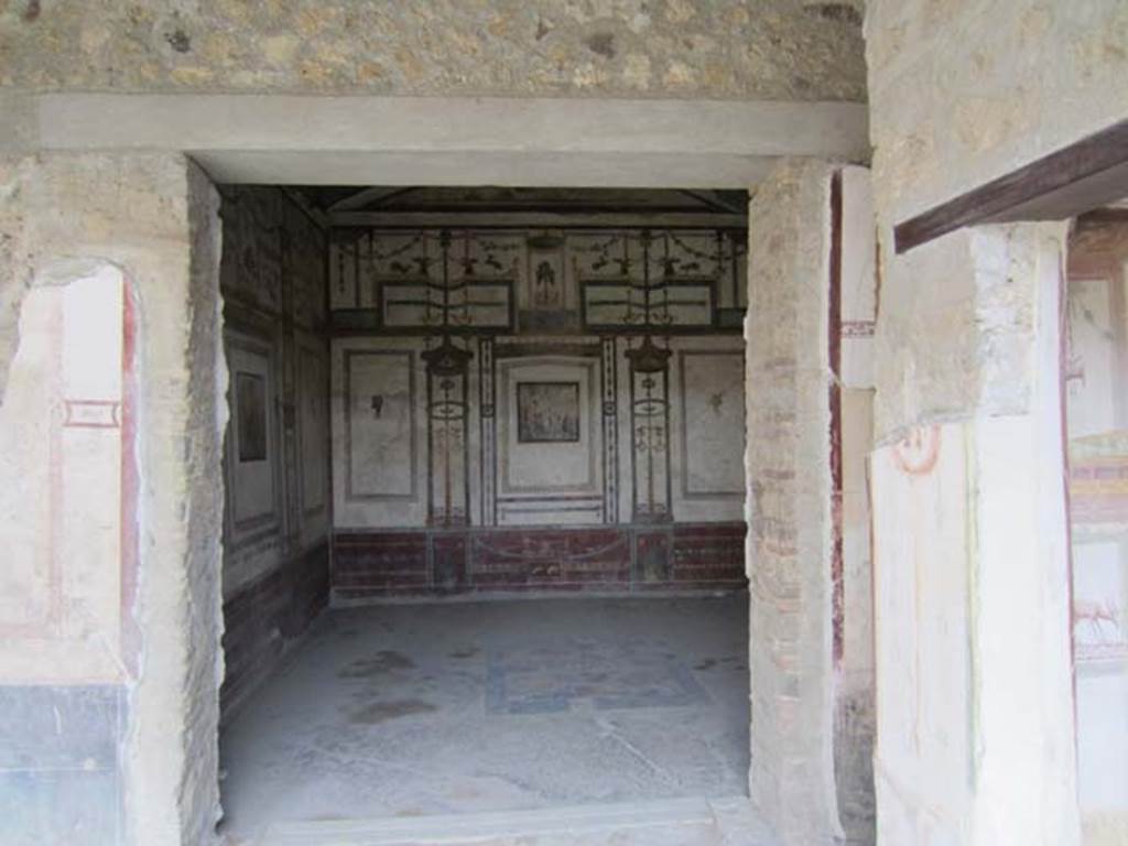 VI.15.8 Pompeii. April 2012. South-east corner of portico, with doorways to oecus, recess and summer triclinium. Photo courtesy of Marina Fuxa.