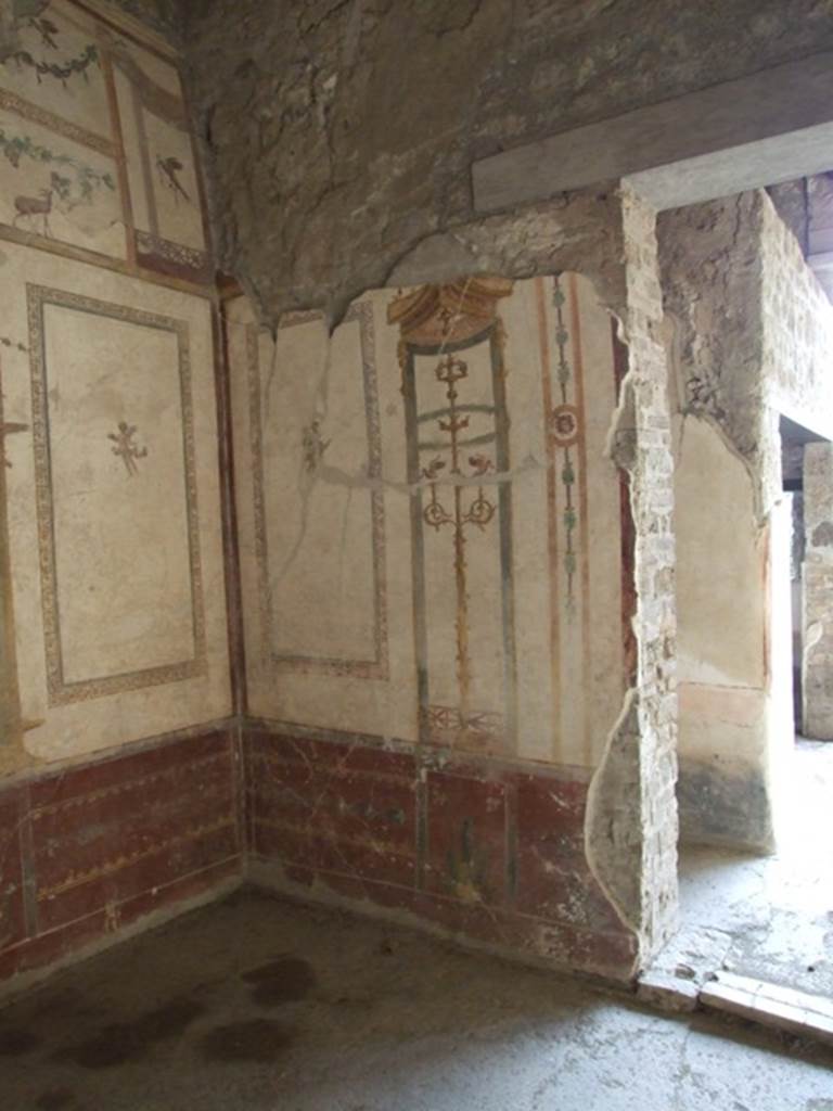 VI.15.8 Pompeii. December 2007. South-west corner of oecus with doorway to portico.