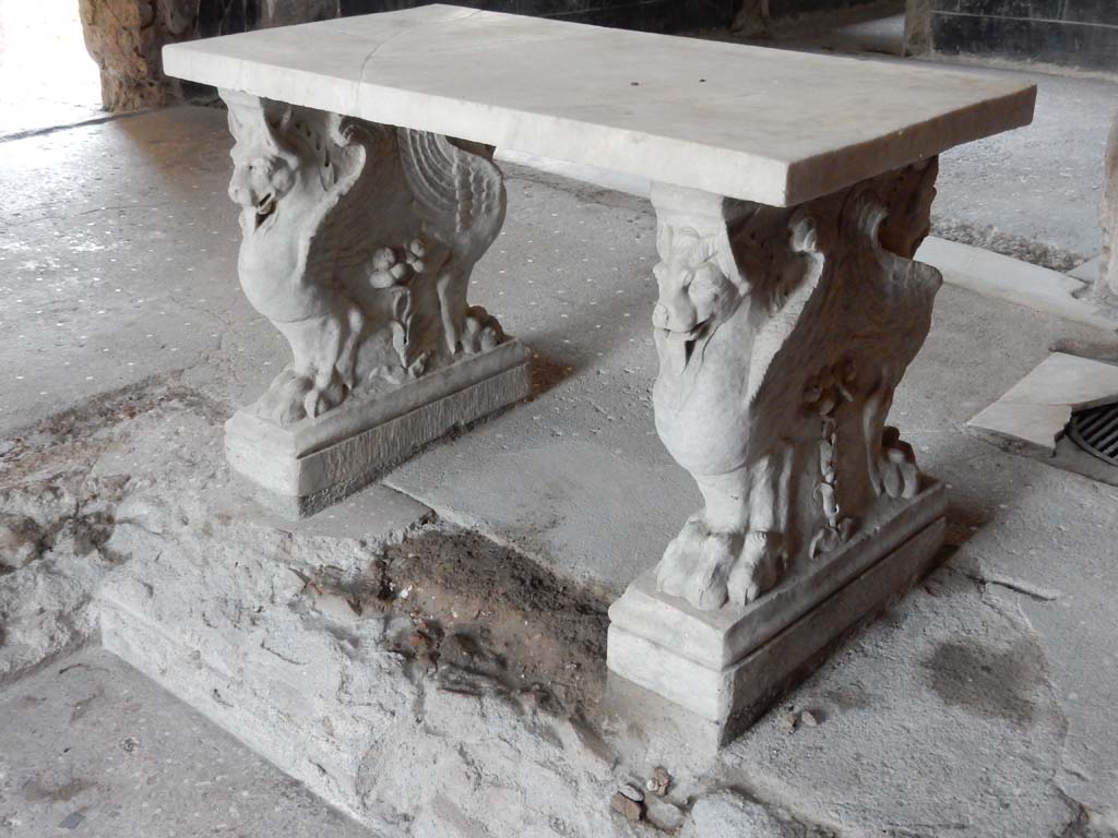 VI.15.8 Pompeii. June 2019. Looking towards marble table at west end of impluvium. 
Photo courtesy of Buzz Ferebee.
