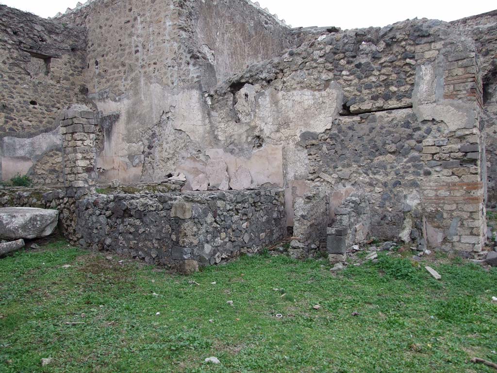 VI.16.3 Pompeii. December 2007. North wall with remains of vats for fulling.
