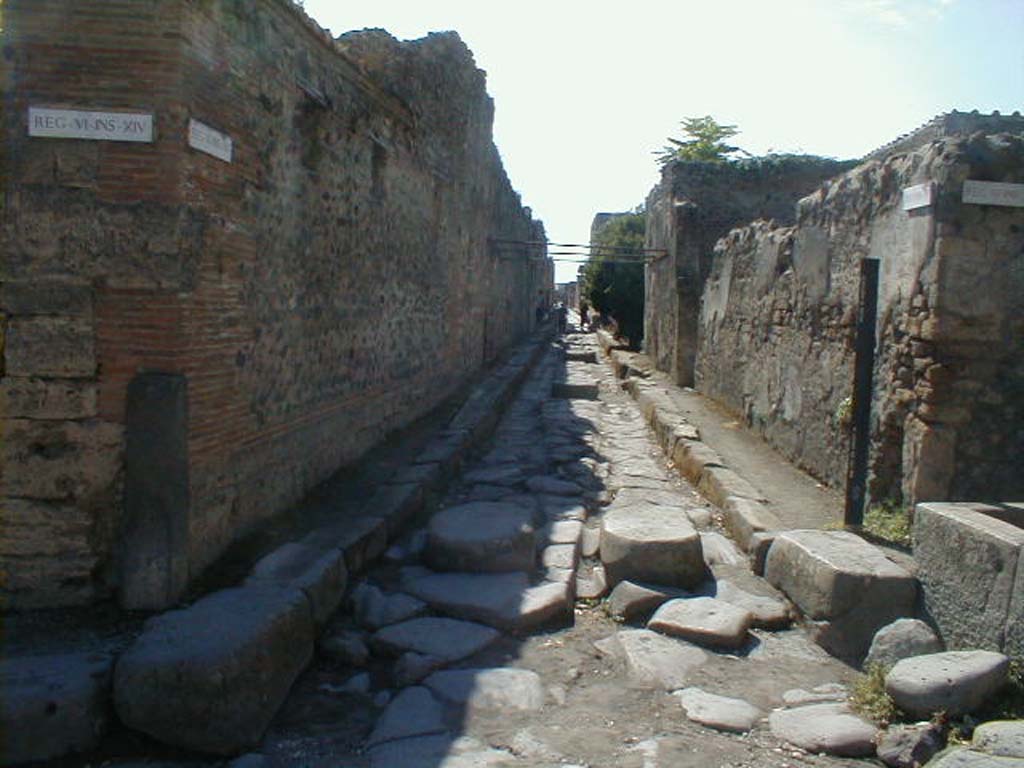 VI.14 Pompeii, on left. September 2004.                     Vicolo di Mercurio looking west.                    VI.16.3, on right.
According to Della Corte, four electoral recommendations found above three corners of this crossroad, all speak of a Salarius Crocus. They read –
(M’ Salarius) Crocus cupit  [CIL IV 6647]
Salarius rog(at)                      [CIL IV 6645]
Crocus c(upidu)s f(acit)      [CIL IV 6667]
Salarius (rogat)                     [CIL IV 3491 – with Note 2]
He thought the first two were from the proprietor of VI.16.3, whereas the last two were probably the proprietor or owner of VI.14.30, Casa del Laocoonte.
See Della Corte, M., 1965. Case ed Abitanti di Pompei. Napoli: Fausto Fiorentino.(p.89)

According to Epigraphik-Datenbank Clauss/Slaby (See www.manfredclauss.de) these read -

L(ucium) Albucium 
/ 
aed(ilem) 
Crocus cupi[t]        [CIL IV 6647]

Modestum aed(ilem) 
Salarius rog(at)      [CIL IV 6645]

Samellium 
aed(ilem) Crocus c(upidu)s f(acit)       [CIL IV 6667]

M(arcum) Holconium 
IIv(irum) i(ure) d(icundo) o(ro) v(os) f(aciatis) Salarius       [CIL IV 3491]

