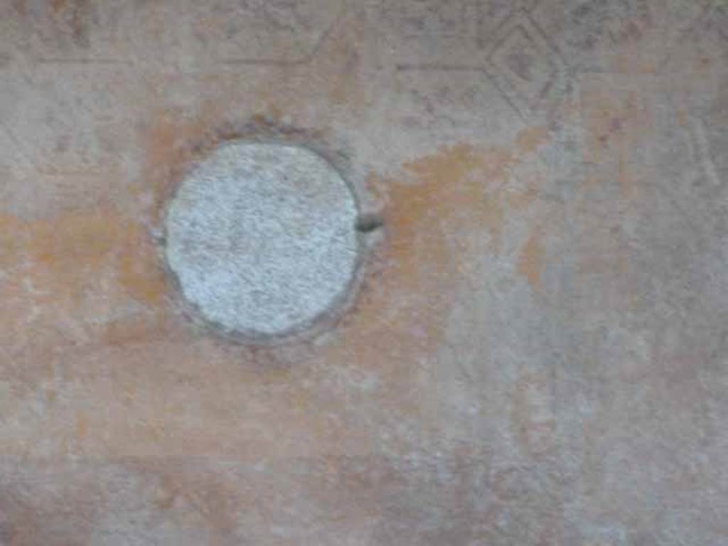 VI.16.7 Pompeii. May 2010. The site of the glass medallion on the right of the north wall.