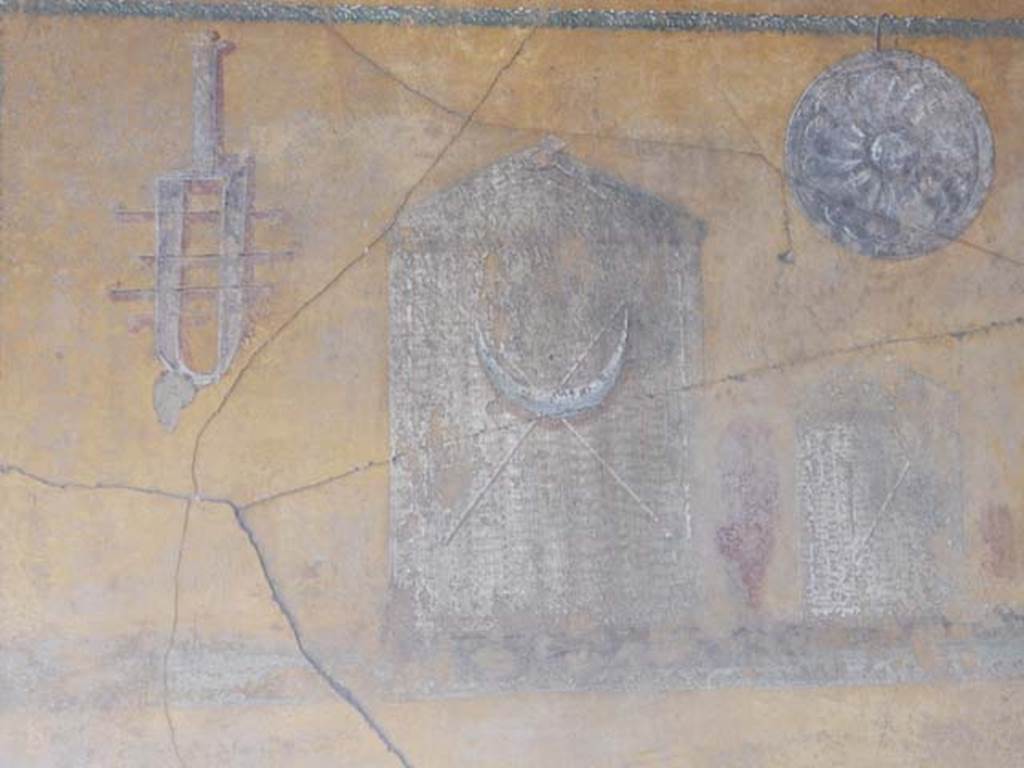 VI.16.7 Pompeii. May 2016. Room F, detail from east wall of lararium. Photo courtesy of Buzz Ferebee.
