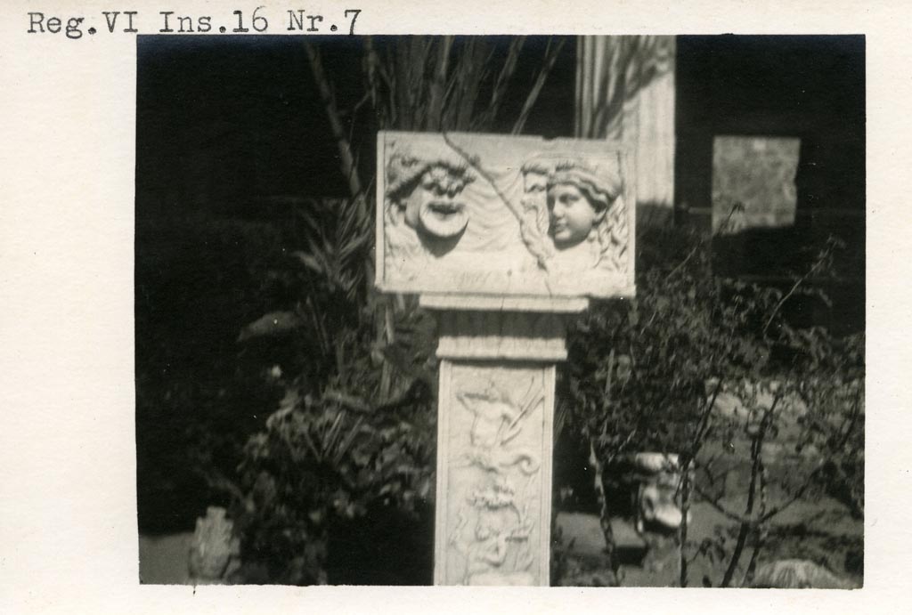 VI.16.7 Pompeii. Pre-1937-39. Marble relief with masks on a pilaster in peristyle garden
Photo courtesy of American Academy in Rome, Photographic Archive. Warsher collection no. 494.
