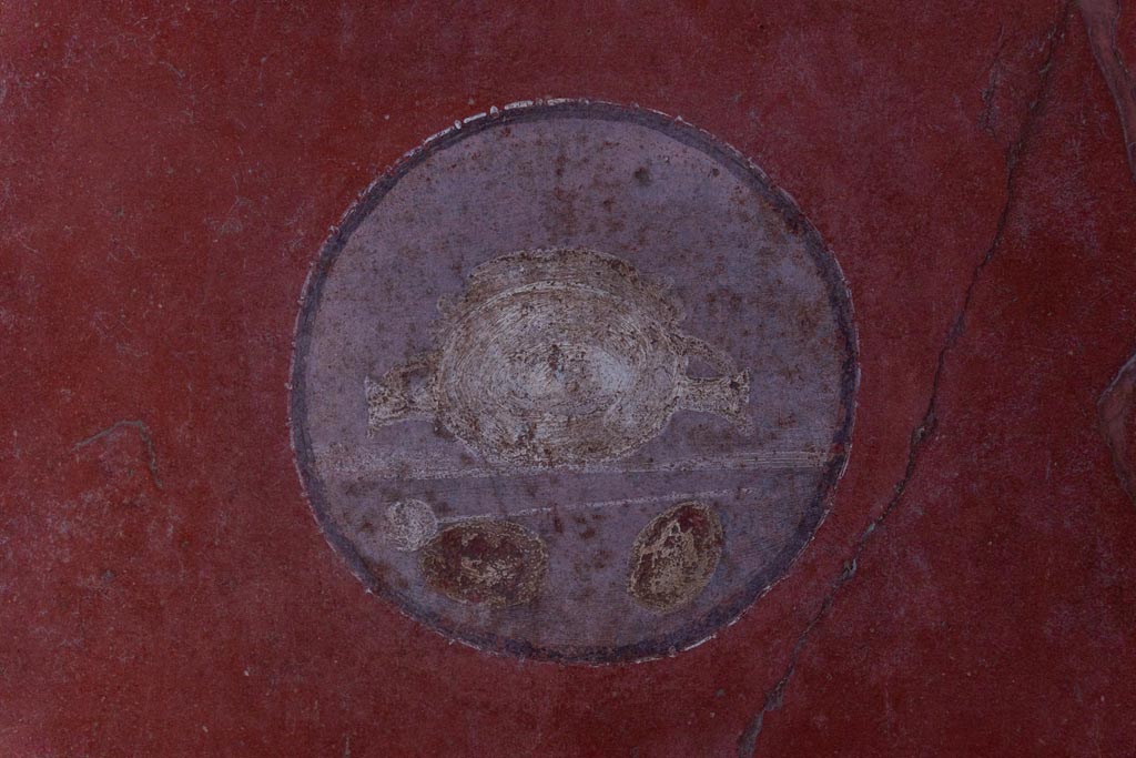 VI.16.15 Pompeii. January 2024. Room F, medallion painting from red panel at north end of west wall. Photo courtesy of Johannes Eber.

