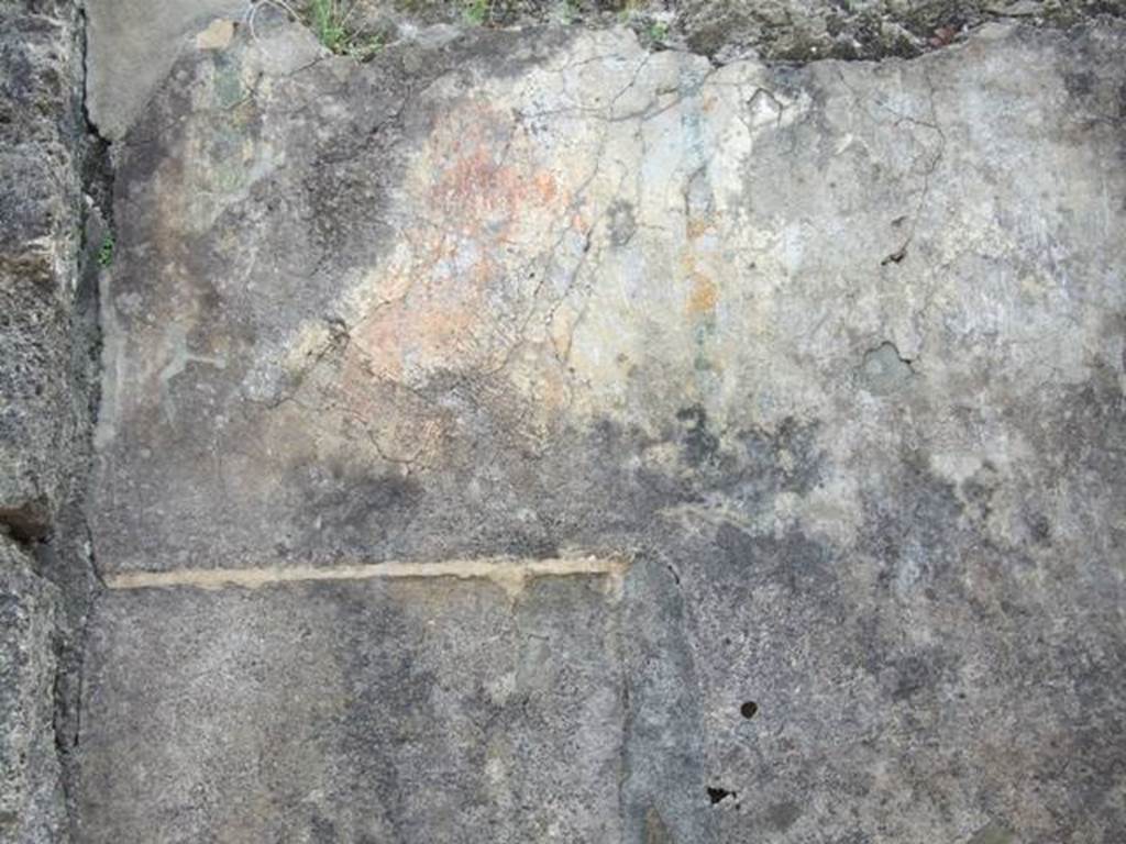 VI.16.27 Pompeii. March 2009. Room B, recess in atrium. The painting of Jupiter or Jove is just visible on the south wall of the recess. The small remains of a painted green stripe or garland are also just visible on the left.