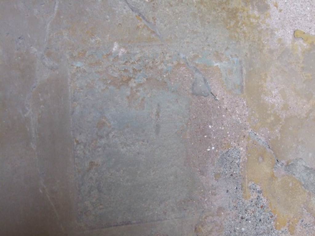 VI.16.27 Pompeii. March 2009. Room G, remains of wall painting at east end of north wall of triclinium. According to PPP, this was of Aphrodite Pescatrice. See Notizie degli Scavi di Antichità, 1908, 187.
See Bragantini, de Vos, Badoni, 1983. Pitture e Pavimenti di Pompei, Parte 2. Rome: ICCD. (p.365)
According to NdS, at the other end, on the right of the north wall, was a painting of equal size of Venus Fishing. Venus was seated on a rock on the right, and looking towards the left.
The upper part of her body was naked, the lower was wrapped in a reddish cloak. Her arms were adorned with armbands, and a necklace hung down from her neck.