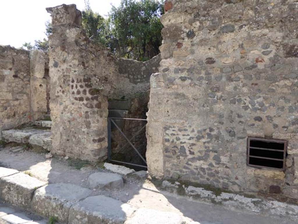 VI.17.13–12 Pompeii. Street façade and doorways to VI.17.13 with steps, on left, and VI.17.12, on right. Photo courtesy of Michael Binns.