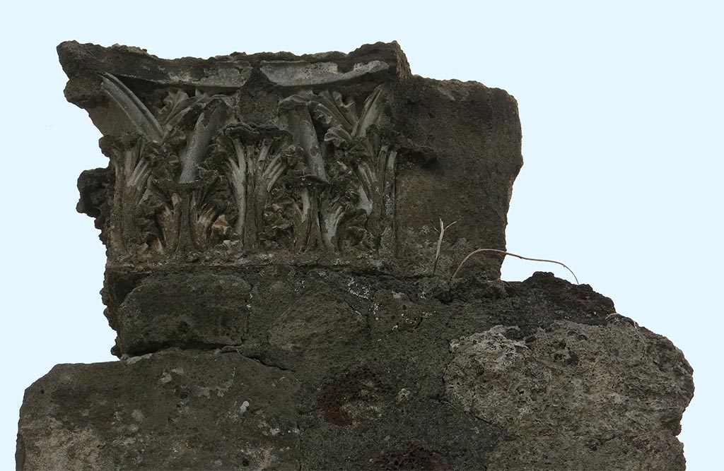 VI.17.13 Pompeii. September 2015. East (street) side of Corinthian capital on north side of entrance doorway.