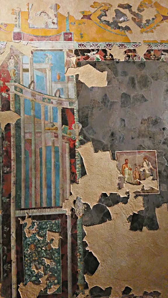 VI.17.42 Pompeii. 2019. 
Detail of part of recomposed fresco of architectural view and central painting of the poet Euphorion (c.30-35AD).
On display in exhibition “Pompei e Santorini” in Rome, 2019. Photo courtesy of Giuseppe Ciaramella.
