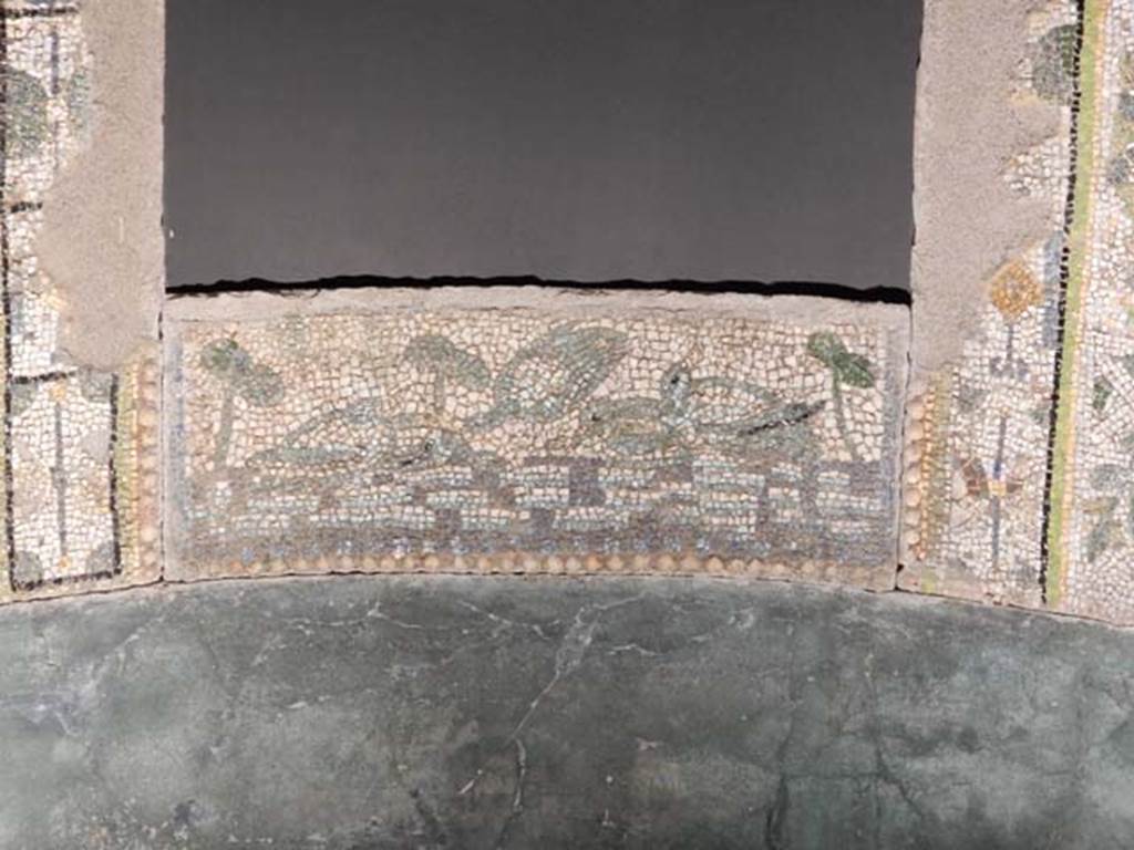 VI.17.42, Pompeii, May 2018. Detail at rear of reconstruction of base of nymphaeum. Photo courtesy of Buzz Ferebee.

