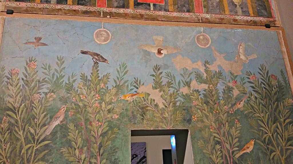 VI.17.42 Pompeii. December 2019. Oecus 32, detail of part of garden fresco from upper east wall.
On display in exhibition “Pompei e Santorini” in Rome, 2019. Photo courtesy of Giuseppe Ciaramella.