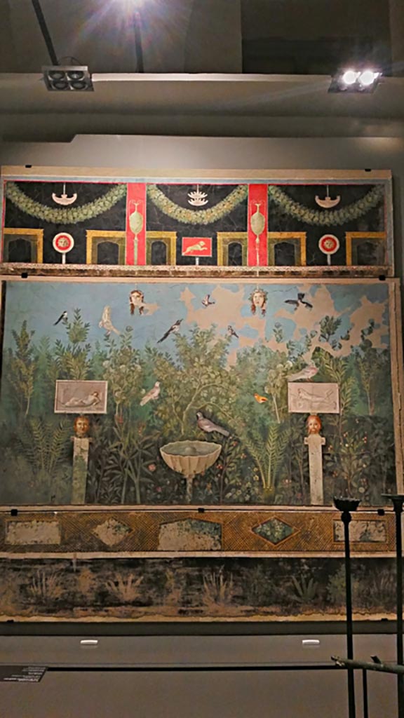 VI.17.42 Pompeii. December 2019.
Oecus 32, looking toward painted north wall from large reception room decorated with luxurious garden.
On display in exhibition “Pompei e Santorini” in Rome, 2019. Photo courtesy of Giuseppe Ciaramella.