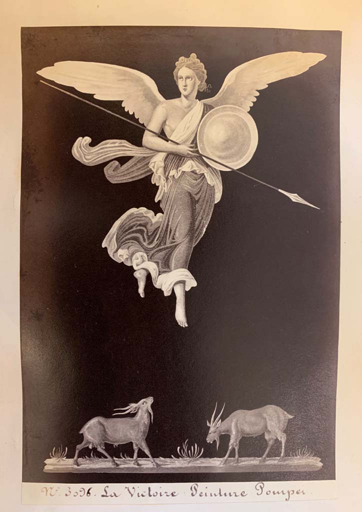 VII.1.25 Pompeii. Peristyle 31. An armed Victory in flight and frieze portraying goats.
From an album of Michele Amodio dated 1874, entitled “Pompei, destroyed on 23 November 79, discovered in 1745”.
Photo courtesy of Rick Bauer.