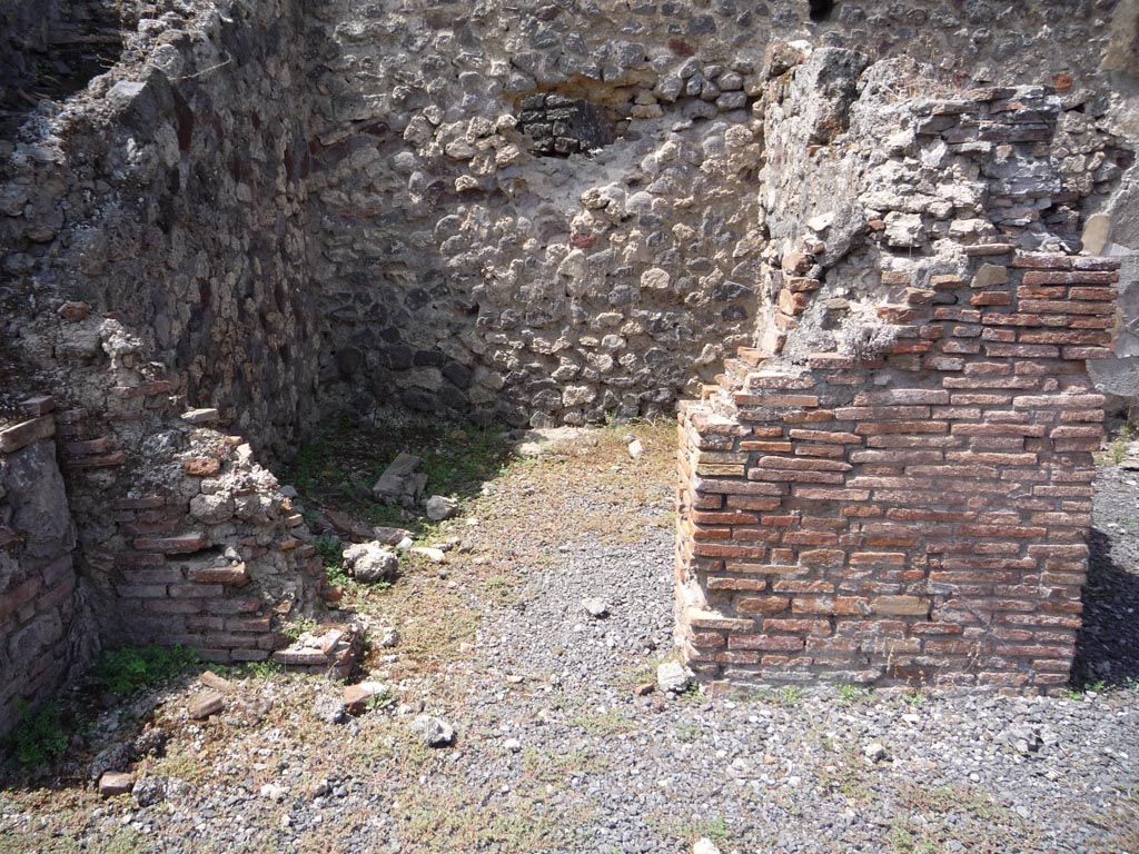 VII.1.36 Pompeii. October 2009. Looking west to doorway to room in south-west corner of atrium. Photo courtesy of Jared Benton.