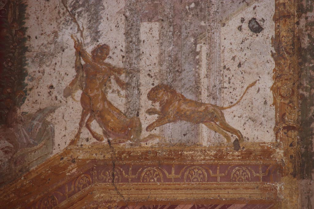 VII.1.47 Pompeii. October 2023. Exedra 10, detail of Centaur and Lion from north wall at west end. Photo courtesy of Klaus Heese.