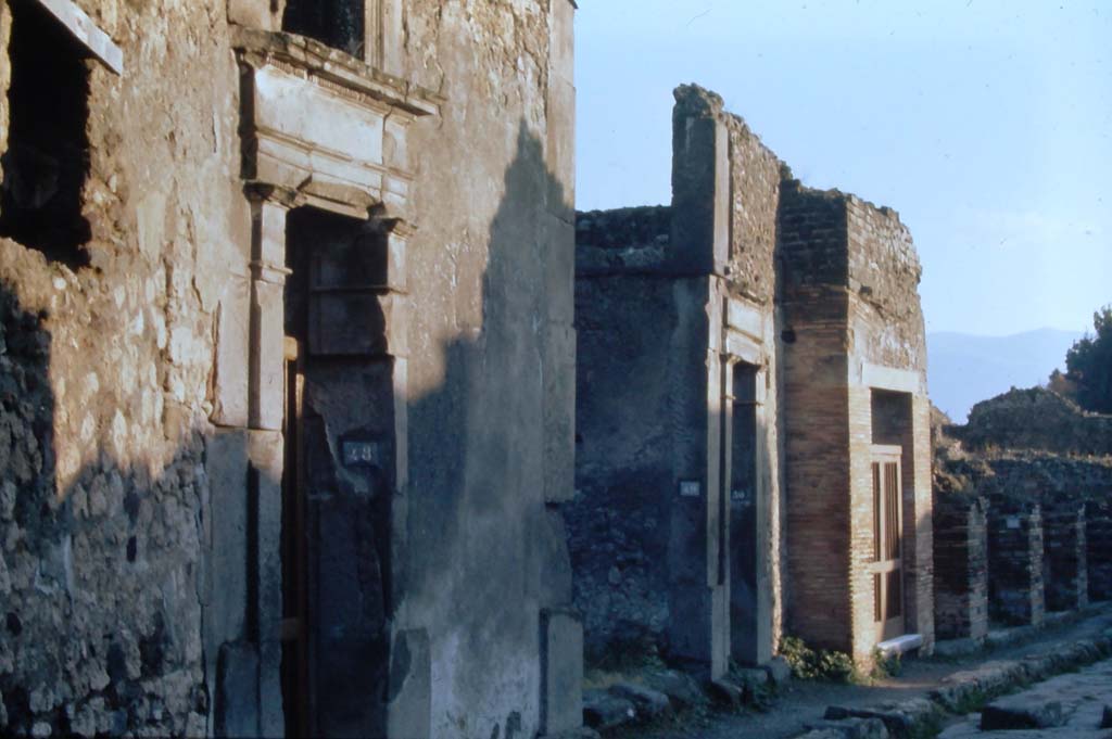 VII.1.48, Pompeii, on left. 4th December 1971. Looking south on Vicolo del Lupanare. 
Photo courtesy of Rick Bauer, from Dr.George Fays slides collection.
