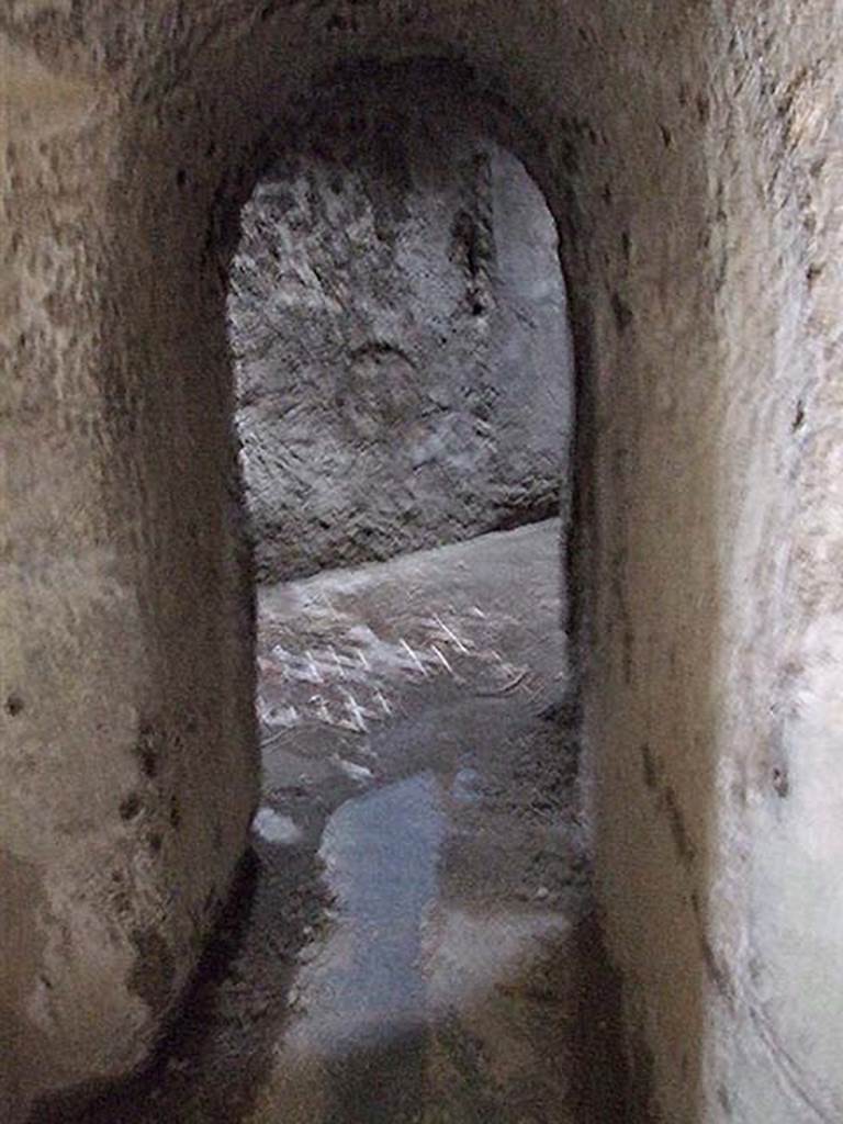 VII.1.48 Pompeii. December 2007. Exit from corner of womens changing room 11 to Corridor K.