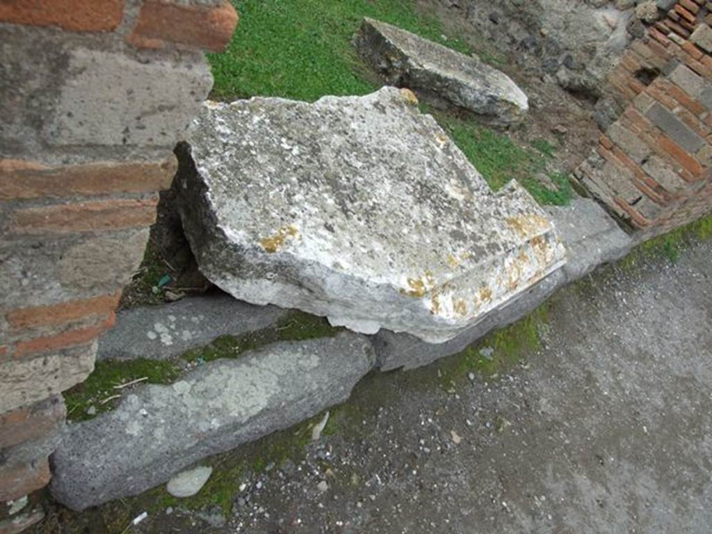 VII.2.5 Pompeii. December 2007. Travertine block (podium or table?) lying over entrance sill.
