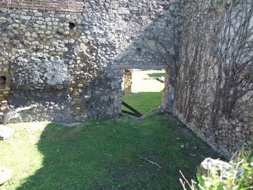 VII.2.11 Pompeii.  March 2009.  Oecus, looking east to atrium and impluvium of VII.2.6l, photo taken from VII.2.16.