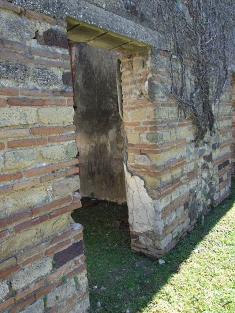 VII.2.18 Pompeii.  March 2009. Doorway to Room 13. Cupboard.