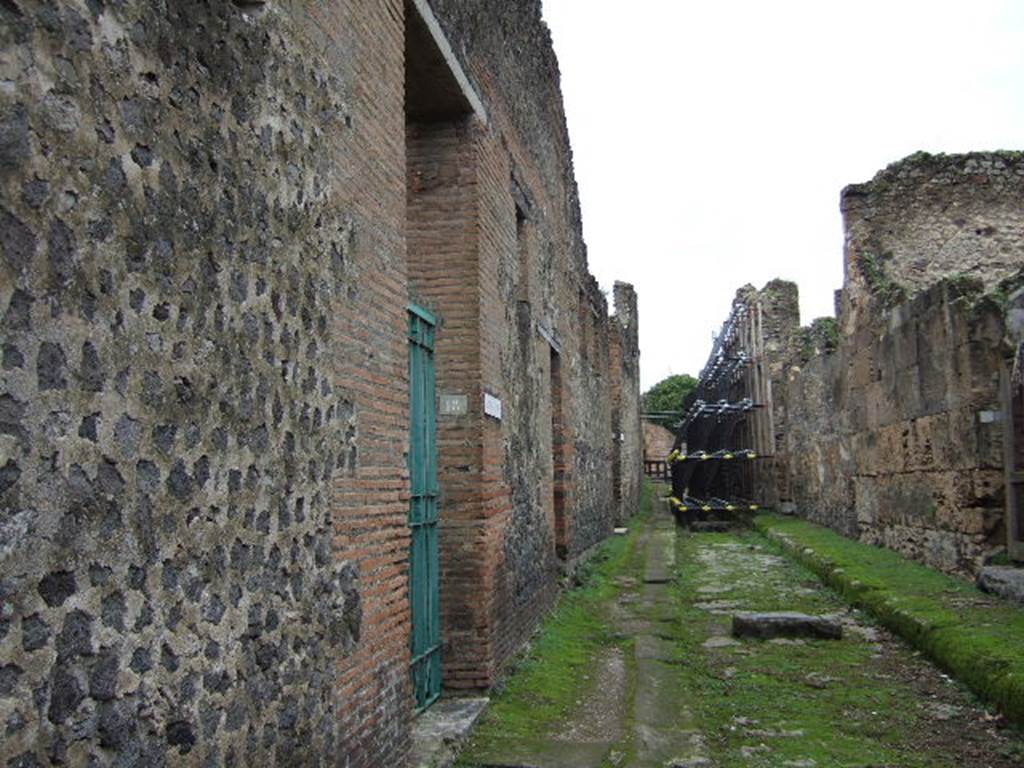 VII.2.18 Pompeii. December 2004. Vicolo del Panettiere looking west .