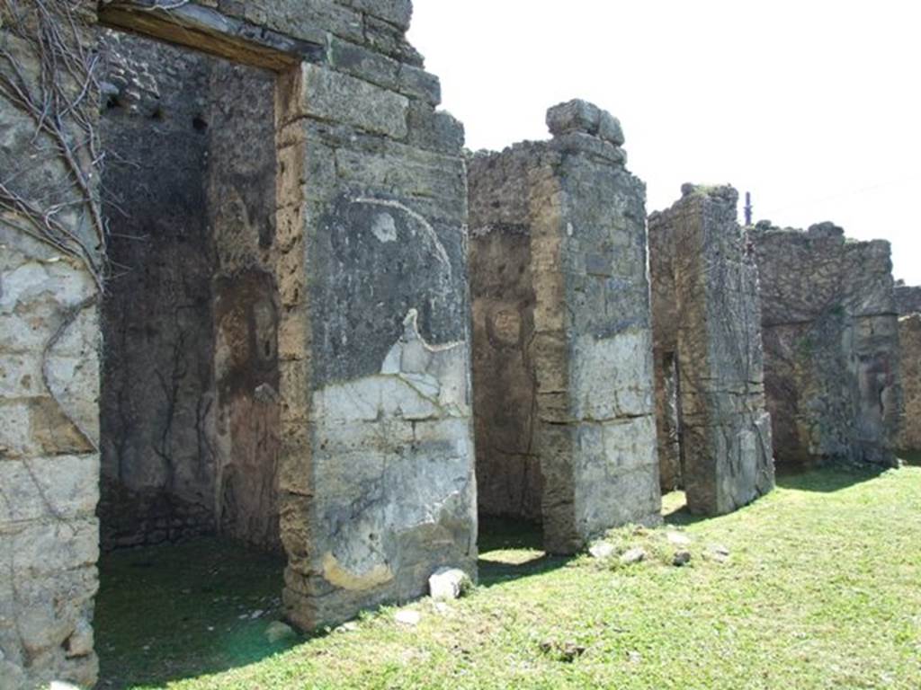 VII.2.20 Pompeii. March 2009. Room 1, east side of atrium showing doorways to rooms 3, 4, 5 and 6. Looking south-east.