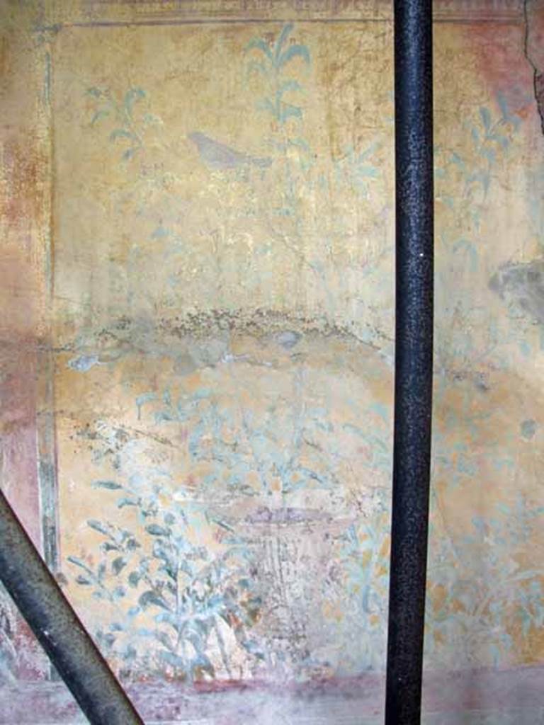 VII.2.25 Pompeii. March 2009. Viridarium, south end of east wall. Painting of plants and birds, with a painted urn or crater.