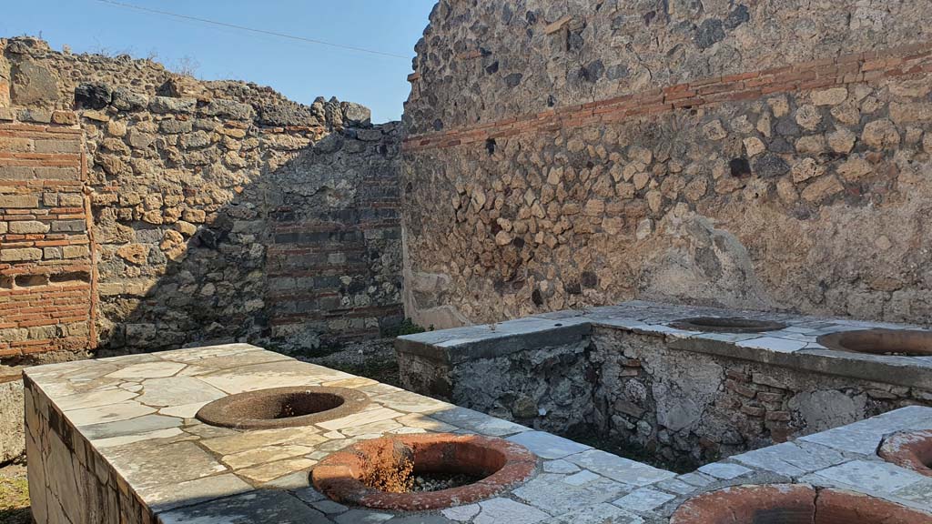 VII.2.32 Pompeii. July 2021. Looking north-east across counter towards remaining stucco on east wall, and north-east corner.
Foto Annette Haug, ERC Grant 681269 DCOR.

