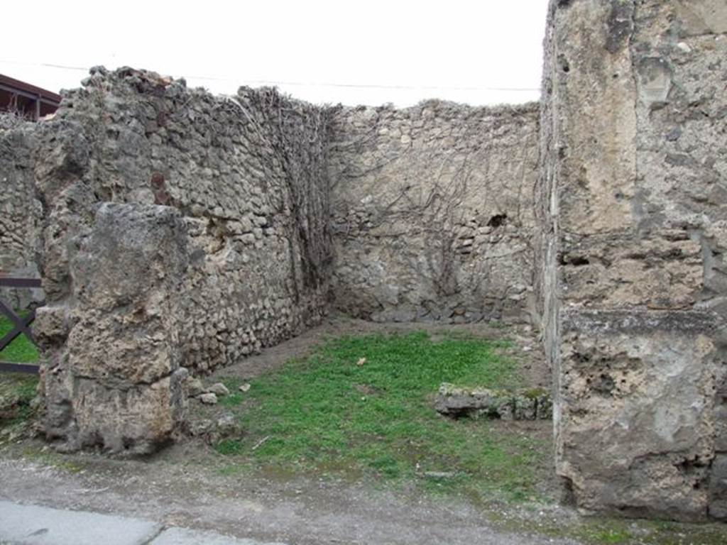 VII.2.50 Pompeii.  Shop.  December 2007.  West and north walls.