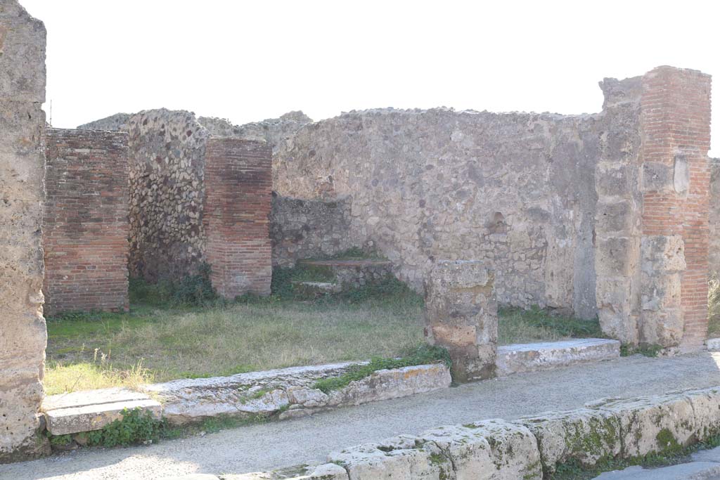 VII.3.12, on left and VII.3.11 Pompeii. December 2018. Looking south-west from Via della Fortuna. Photo courtesy of Aude Durand.