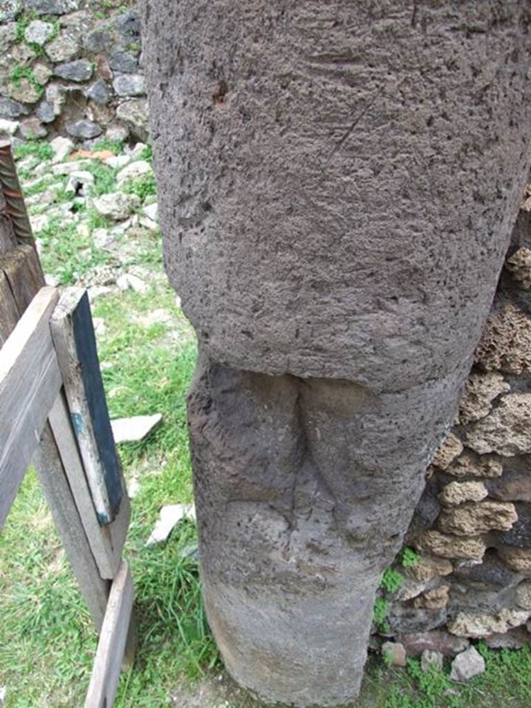 VII.3.11 Pompeii. March 2009. South west side of corridor. Lower Tufa part of column.