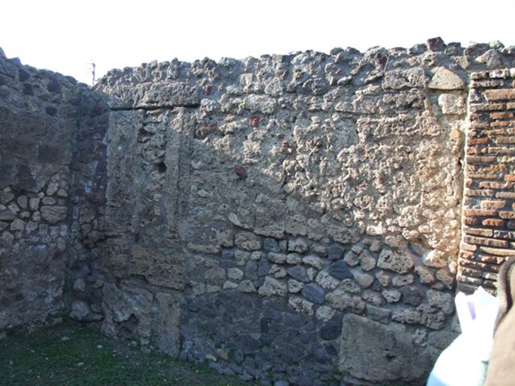 VII.4.31 Pompeii.  March 2009.  North Peristyle.  North west corner, with blocked door to shop at VII.4.52.