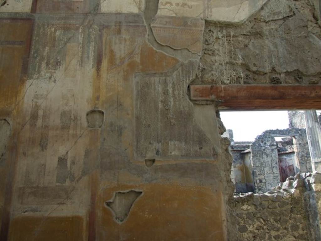 VII.4.31 Pompeii. March 2009. Room 12, west wall of oecus.  Wall painting of Perseus and Andromeda, portrayed as a pair of lovers.  Central panel cut out and taken to Naples Museum.  Inventory Number 8996.
