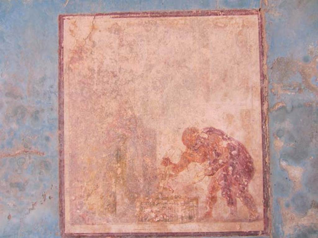 VII.4.31/51 Pompeii. May 2012. Room 18, south wall of exedra. Wall painting in central panel entitled “The Eros Shop”. Photo courtesy of Marina Fuxa.
