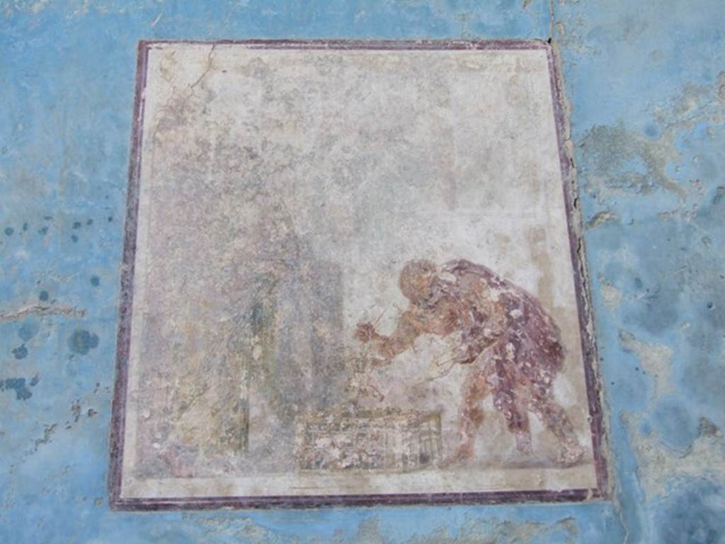 VII.4.31 Pompeii.  March 2009.  Room 18. Exedra.  Wall painting in central panel on south wall.  “The Eros Shop”.