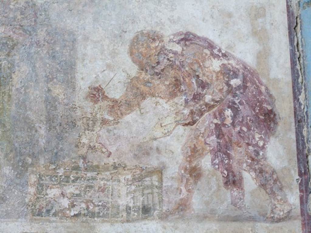 VII.4.31 Pompeii.  March 2009.  Room 18. Exedra. The figure is shown lifting one of his cupids from its cage for sale.

