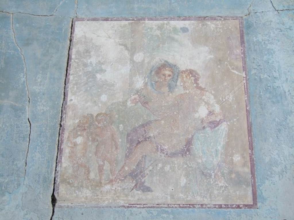 VII.4.31 Pompeii.  March 2009.  Room 18. Exedra.  North wall.  Wall painting of Adonis reclining in Aphrodite’s lap,  on the left can be seen two cupids.