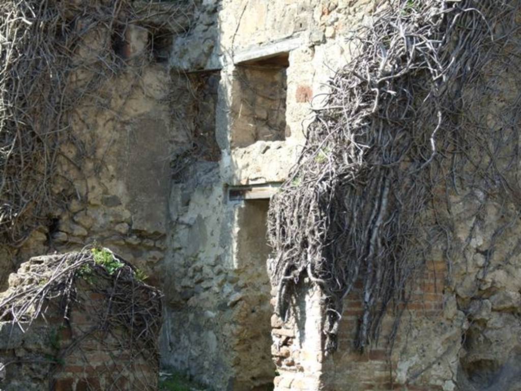VII.4.39 Pompeii. March 2009. Looking north west from entrance. Doorway to workshop.