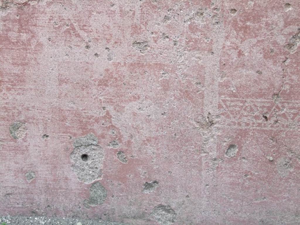 VII.4.48 Pompeii.  March 2009. Room 2.  Atrium. North wall. Painted plaster with faded decoration.