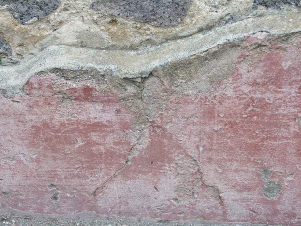 VII.4.48 Pompeii. March 2009.  Room 2. Atrium. North wall. Coin imprints in the plaster.