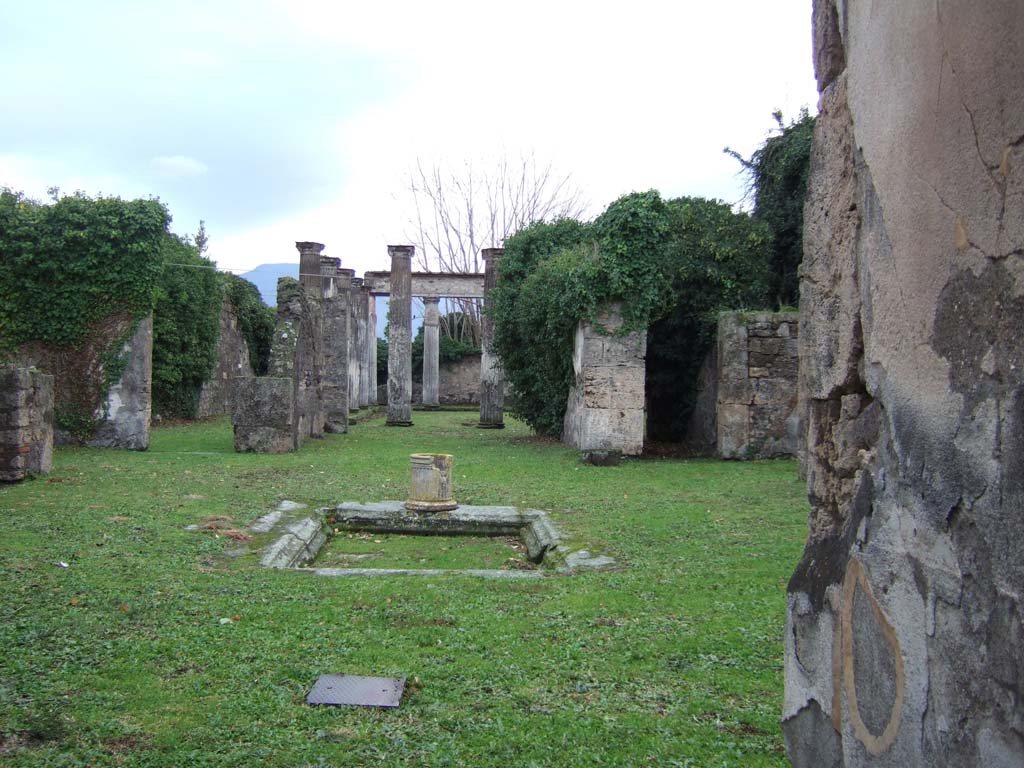 VII.4.57 Pompeii. December 2005. Looking south across atrium and impluvium. 