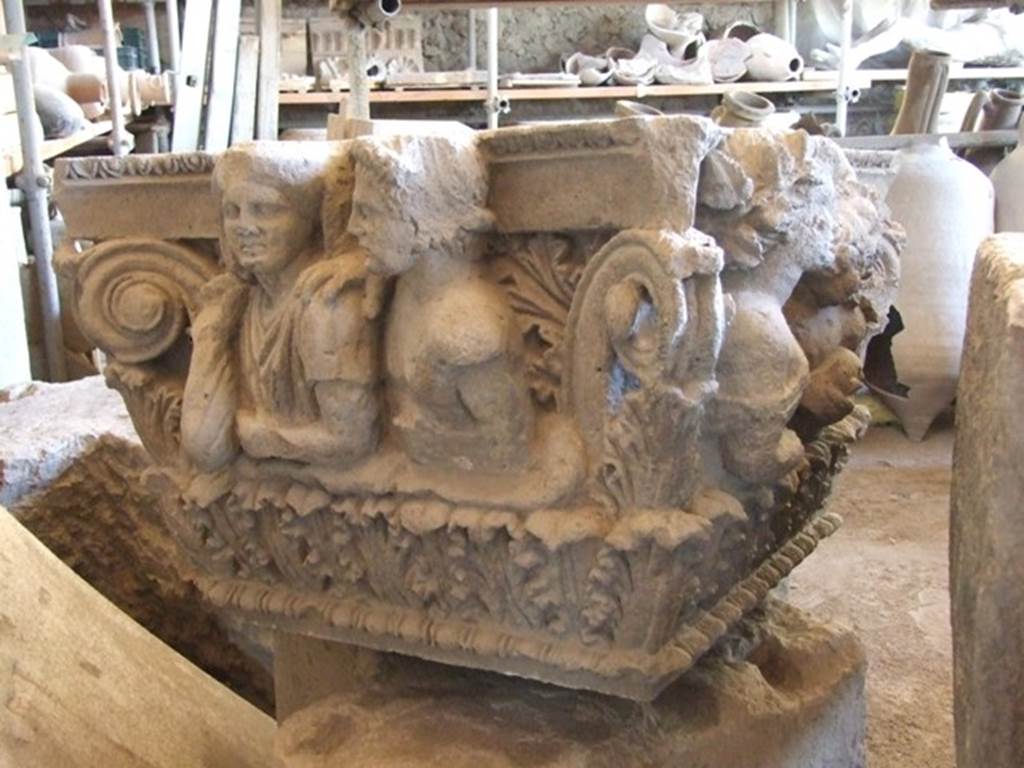 VII.4.57 Pompeii. December 2006, on display in Forum Granaio at VII.7.29.
Figures of a man and woman on a capital. This faced into the vestibule on the top of right-hand side of entrance.