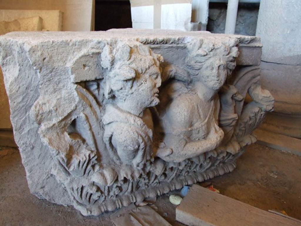 VII.4.57 Pompeii. December 2006, on display in Forum Granaio at VII.7.29.
Satyr pursuing a maenad on a capital. This faced the Via della Fortuna on the top of left-hand side of entrance.