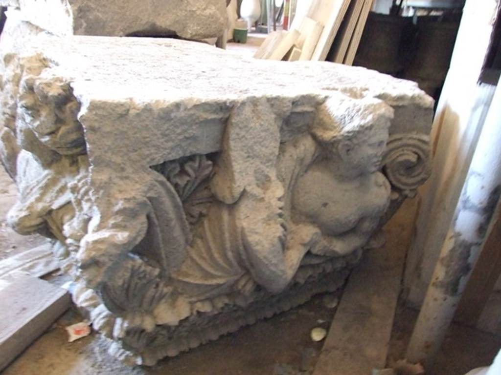 VII.4.57 Pompeii. December 2006, on display in Forum Granaio at VII.7.29.
Figures of a man and woman on a capital. This faced into the vestibule on the top of left-hand side of entrance.