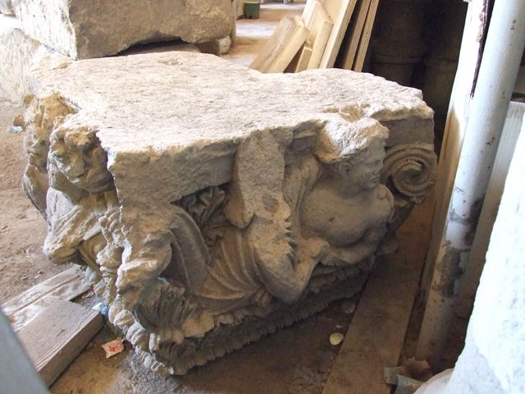 VII.4.57 Pompeii. December 2006, on display in Forum Granaio at VII.7.29.
Figures of a man and woman on a capital. This faced into the vestibule on the top of left-hand side of entrance.