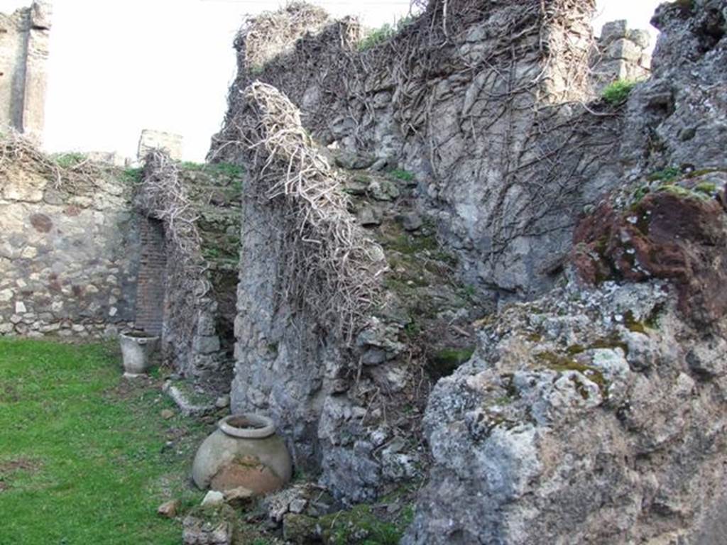 VII.4.58 Pompeii. December 2007. Two rear staircases leading to upper floor.  Looking east along south wall.
